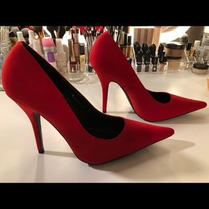 Red Pointy Pumps